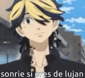 a close up of a person 's face with the words `` sonrie si eres de lujan '' .