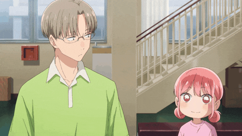 a man and a girl are standing next to each other in a room