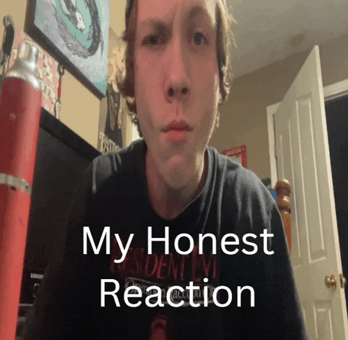 a man wearing a resident evil t-shirt says his honest reaction