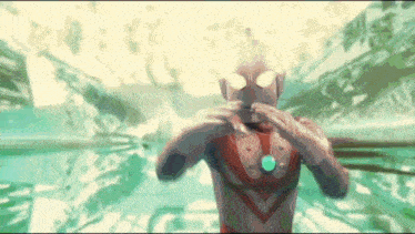 a man in a superhero costume is standing in a swimming pool .