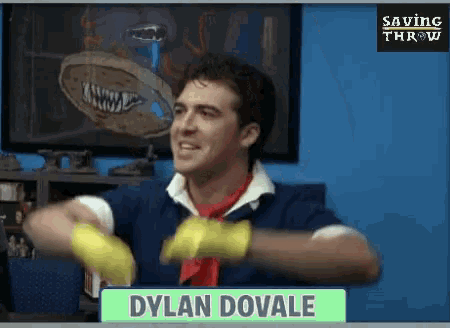 a man wearing yellow gloves has the name dylan dovale on a sign