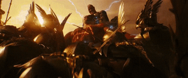 a group of warriors in armor are fighting each other in a battle .