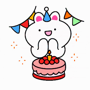 a cartoon of a bunny sitting on top of a cake with candles