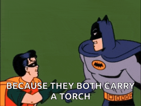 batman and robin are standing next to each other and batman says " because they both carry a torch "