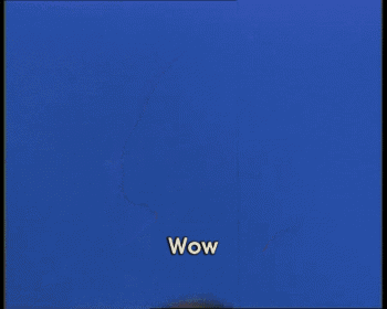 a man with a surprised look on his face and the word wow below him