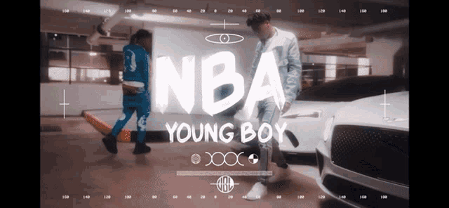 a nba young boy video shows two men standing next to each other