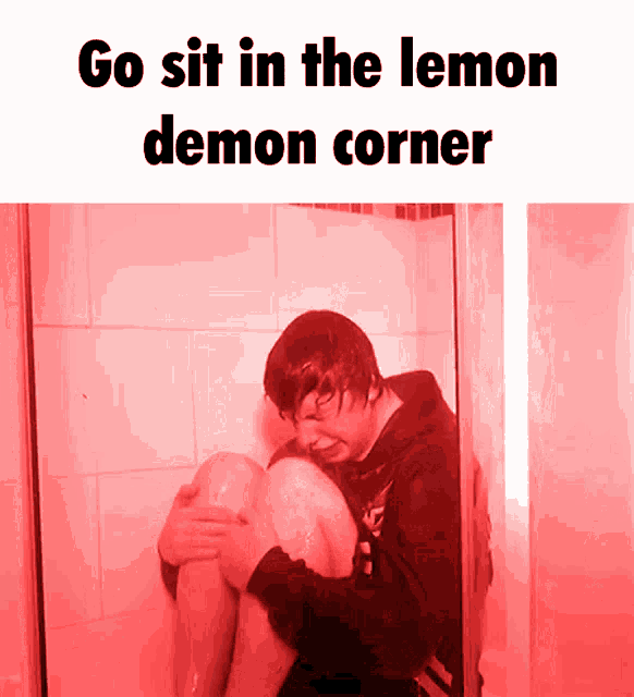 a man sits in a shower with the words go sit in the lemon demon corner on the bottom