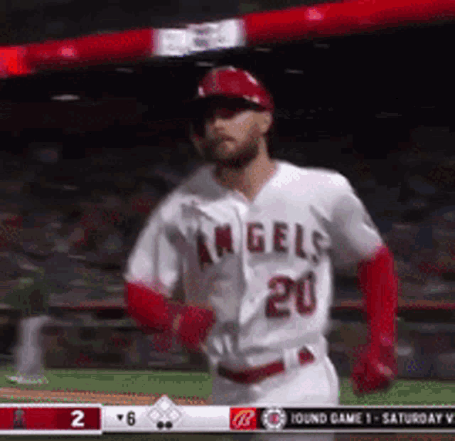 a baseball player with the number 20 on his shirt