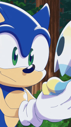 a close up of a sonic the hedgehog holding a ghost 's hand