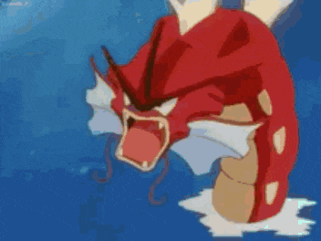 a red pokemon is swimming in the water with its mouth open and a yellow light coming out of it 's mouth .