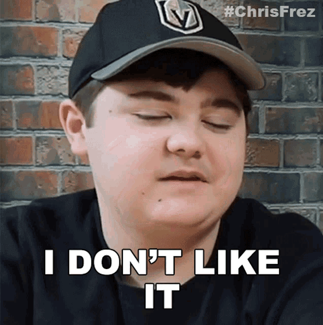 a man wearing a black hat says i don 't like it
