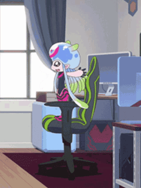 a cartoon character is sitting in a chair in front of a computer monitor