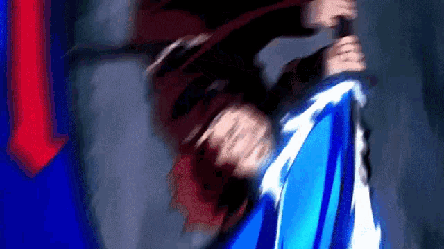 a person is holding a blue and white umbrella in their hand .
