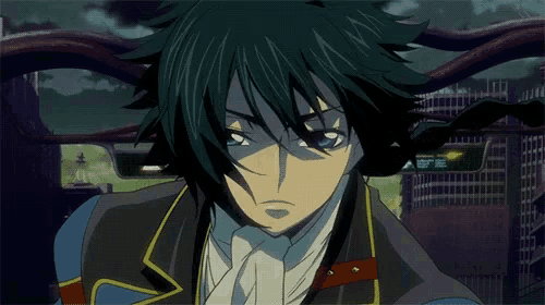 a close up of a person 's face with a serious look on his face