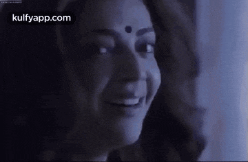 a close up of a woman 's face with the words kulfyapp.com written on the bottom