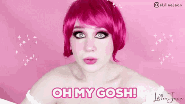 a woman with pink hair and blue eyes is making a funny face and says oh my gosh .