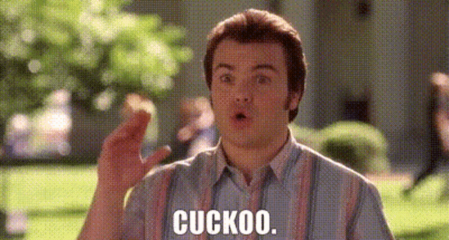 a man in a striped shirt is holding a piece of food and says cuckoo .