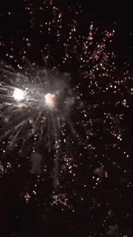 a red and white explosion with the word m in the background