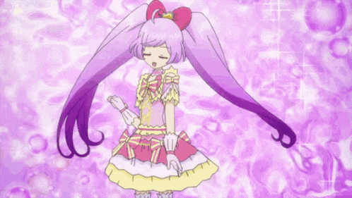 a girl in a pink and purple dress is dancing