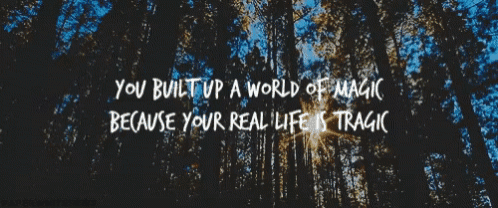a picture of a forest with a quote that says you built up a world of magic because your real life is tragic