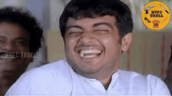 a man in a white shirt is laughing in front of a yellow circle that says hvc troll
