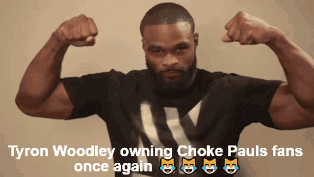 a man flexing his muscles with the words tyron woodley owning choke pauls fans once again below him
