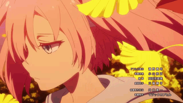 a close up of a girl 's face with a yellow flower in her hair