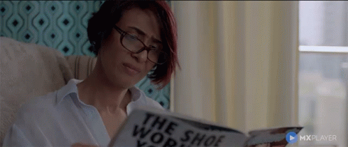 Newspaper Reading Flinched GIF - Newspaper Reading Flinched Astonished GIFs