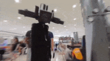 a blurry picture of people walking in a store