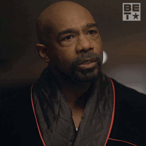 a man in a robe says tell me what happened while pointing