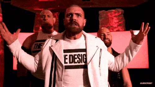 a man wearing a t-shirt that says e desig