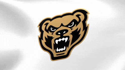 a black and gold bear with a very angry face