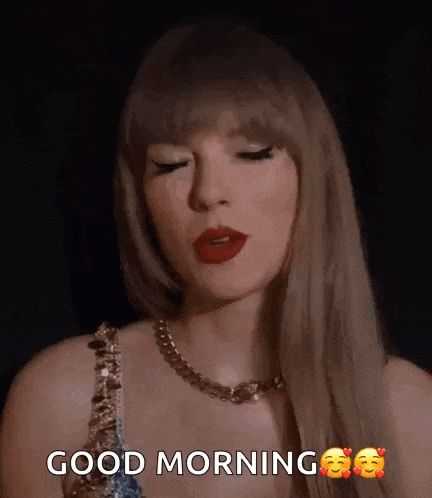 taylor swift is wearing a necklace and says good morning