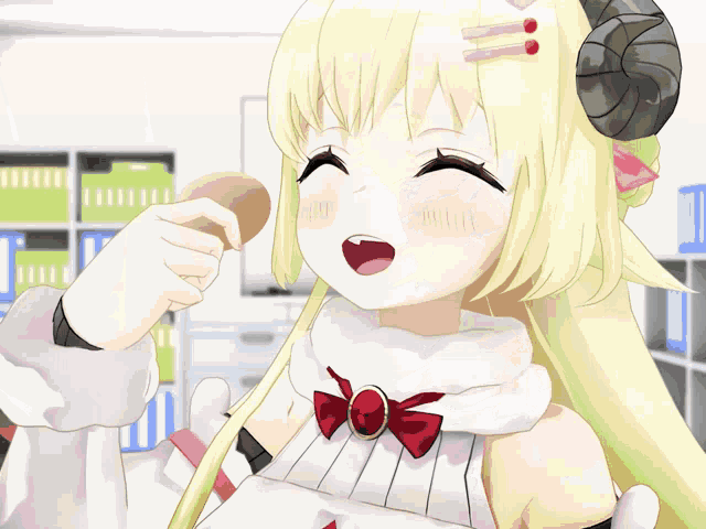 a cartoon girl with horns is eating a piece of food
