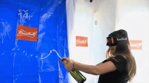 Katie Nolan Celebrate GIF - Katie Nolan Celebrate Spray Champagne GIFs