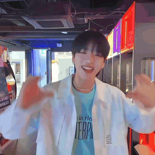 a young man wearing a blue shirt that says terpa on it