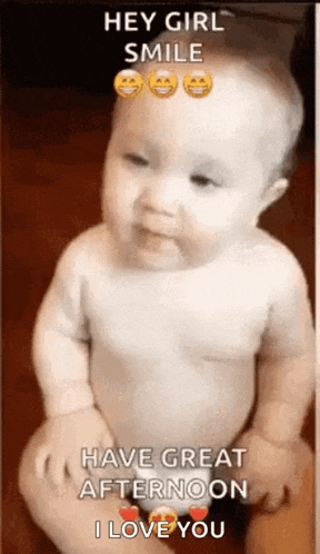 a baby in a diaper is smiling and says hey girl smile have great afternoon i love you .