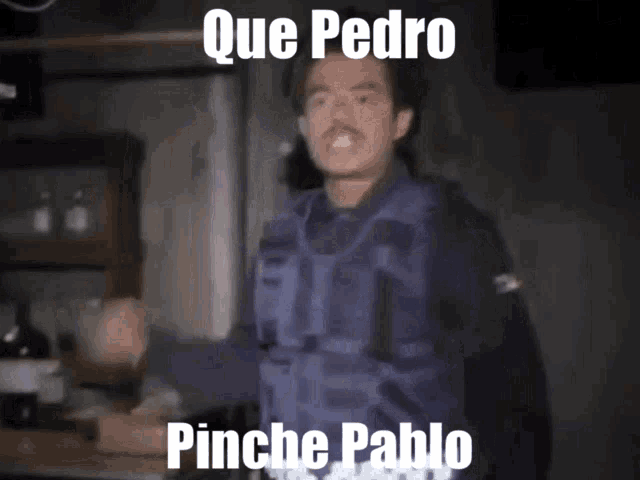 a man in a blue vest with the words que pedro pinche pablo on the bottom
