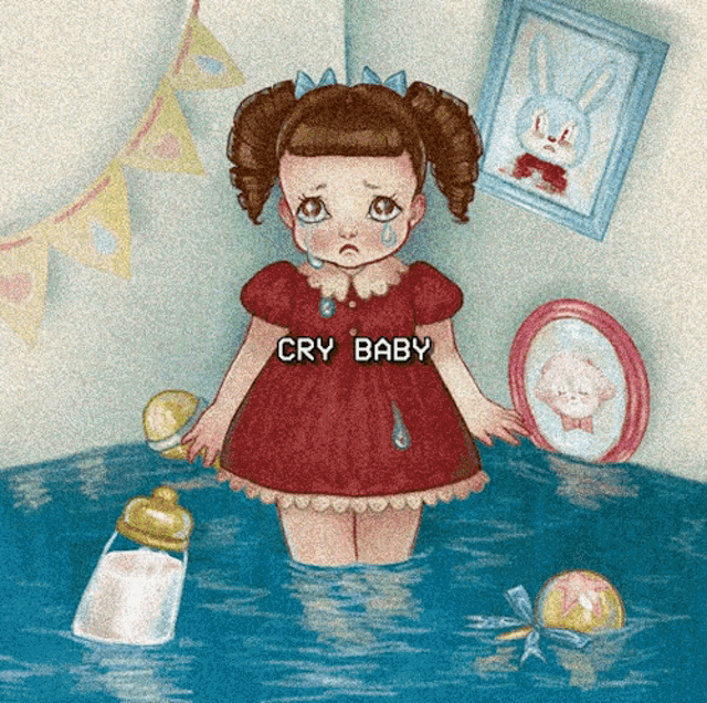 a little girl in a red dress with the words cry baby written on it