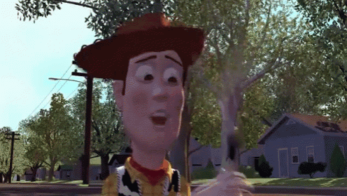 a toy story character with a cowboy hat is standing on a street