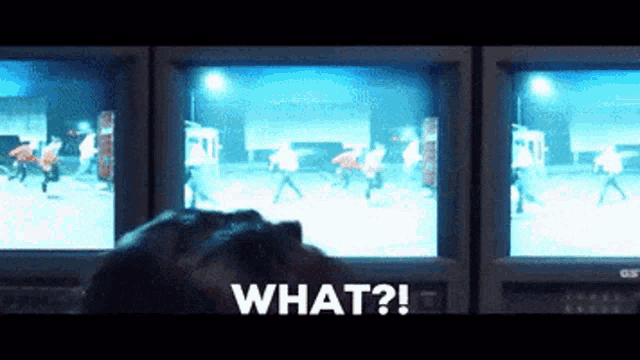 a person is looking at a screen that says " what "