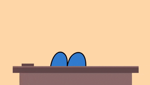 a cartoon character with a pencil and eraser on a desk .