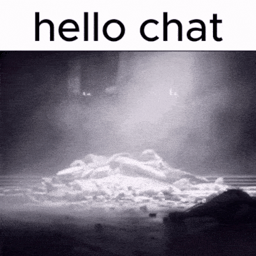 a black and white photo of a pile of rocks with the words hello chat above it