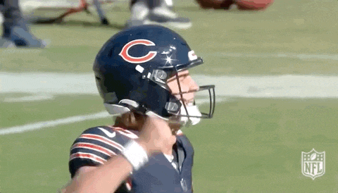 a close up of a football player wearing a bears helmet .