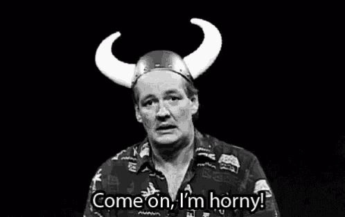 a man wearing a viking helmet with horns is saying `` come on , i 'm horny '' .