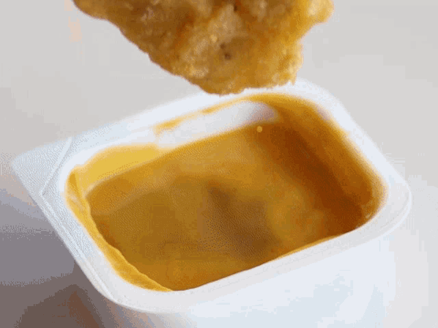 Mcdonalds Chicken Nuggets GIF - Mcdonalds Chicken Nuggets Dip GIFs