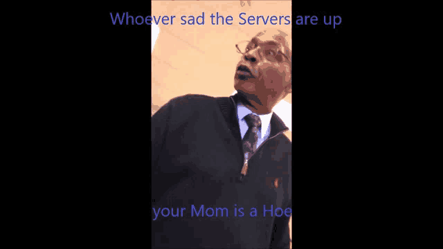 a man in a suit and tie says " whoever sad the servers are up "