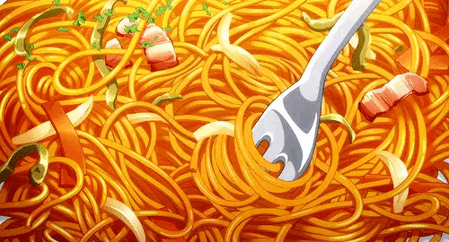 a plate of spaghetti with a fork in it .
