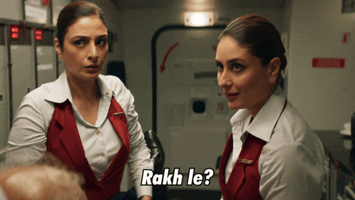 two female flight attendants are standing next to each other and the caption asks " rakh le "