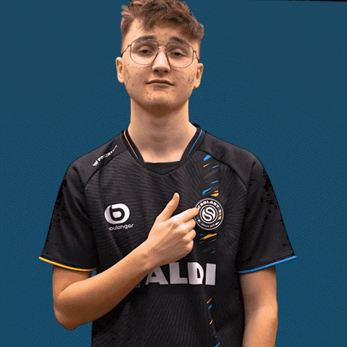 a boy wearing a black shirt that says aldi on it